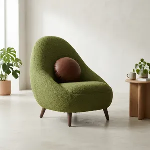 An armchair designed in the shape of an avocado, presented in a contemporary product photography style with professional studio lighting against a minimalist background. - Google Nano Banana 2 Lite