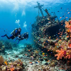 An underwater scene with scuba divers exploring a coral reef alongside colorful fish and a sunken ship. - Google Nano Banana 2 Lite