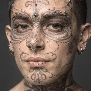 A portrait of a person with elaborate facial tattoos and piercings, shown in sharp detail. - Black Forest Labs Flux 2 Pro