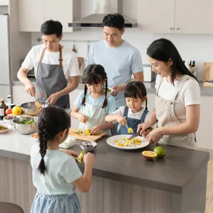 A family cooking together in a kitchen, each person busy with a different task. - Alibaba Z-Image Turbo