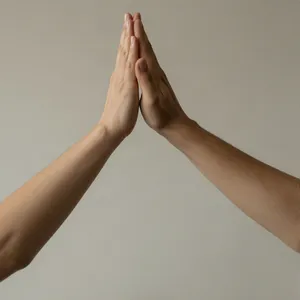 Two people high-fiving, with focus on their hands meeting mid-air. - Alibaba Z-Image Turbo