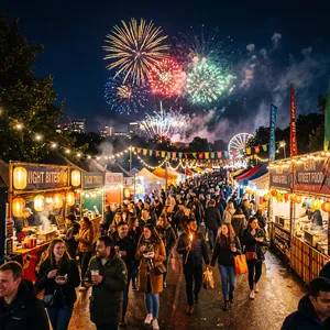 A nighttime festival with fireworks in the sky, food stalls lined up, and crowds mingling. - Google Nano Banana 2