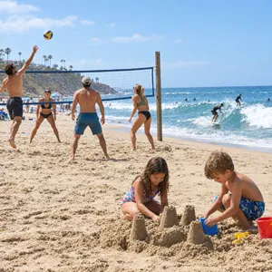 A beach scene: adults playing volleyball, kids building sandcastles, and surfers riding waves. - OpenAI GPT Image 2.5 Flare
