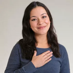 Photorealistic close-up portrait of a person clearly performing the American Sign Language gesture for 