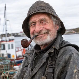 A 4K photo of an old fisherman with a weathered face and a pipe, grinning. - OpenAI GPT Image 2.5 Sunburst