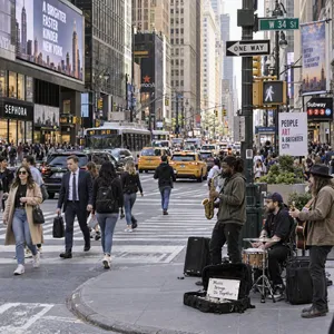 A busy city intersection with cars, pedestrians, and street performers all in one frame. - OpenAI GPT Image 2.5 Sunburst