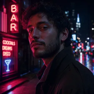 A nighttime portrait of a man lit by neon signs on a city street. - OpenAI GPT Image 2