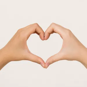 Two hands forming a heart shape together against a plain background. - OpenAI GPT Image 2