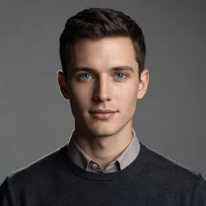 A studio headshot of a young man with one blue eye and one green eye (heterochromia). - XAI Grok Imagine