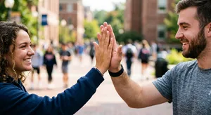 Two people high-fiving, with focus on their hands meeting mid-air. - Google Nano Banana 2