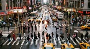 A busy city intersection with cars, pedestrians, and street performers all in one frame. - Google Nano Banana Pro