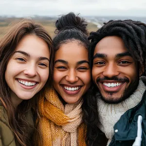 A group selfie of three friends of different ethnic backgrounds smiling at the camera. - Midjourney Midjourney V6.1