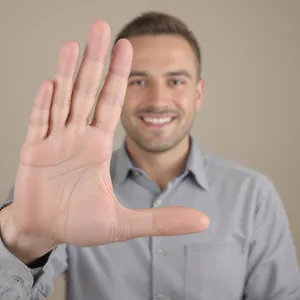Photorealistic close-up portrait of a person clearly performing the American Sign Language gesture for 