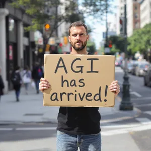 Photorealistic daytime street photograph, clearly showing a man standing still on a busy urban street corner holding a rectangular cardboard sign clearly facing camera, handwritten bold black marker text clearly readable as 