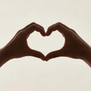 Two hands forming a heart shape together against a plain background. - Bytedance Seedream 3.0