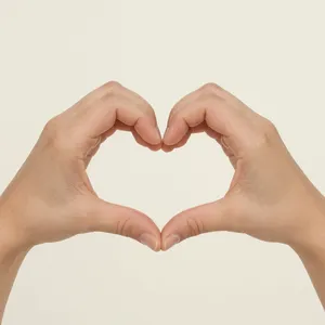 Two hands forming a heart shape together against a plain background. - Reve Reve 2.1