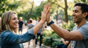 Two people high-fiving, with focus on their hands meeting mid-air. - Google Nano Banana 2 Lite