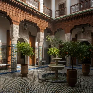 A traditional Moroccan riad courtyard with detailed zellige tilework, flowing fountain, citrus trees, and ornate woodwork. Morning light casting intricate shadow patterns. - Google Imagen 4.0 Ultra