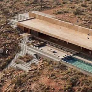 Aerial view of a modernist desert home, in the style of Frank Lloyd Wright's Fallingwater but adapted to desert conditions. Show integration with rocky landscape and water features. - Krea Krea 2 Large