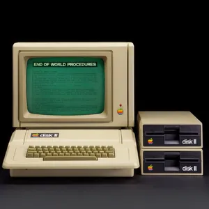 Vintage Apple II computer with green monochrome CRT screen, displaying 'END OF WORLD PROCEDURES' in green text. Two external floppy drives stacked on the right, labeled disk II with rainbow Apple logos. Beige casing, black background, retro aesthetic. - Krea Krea 2 Large
