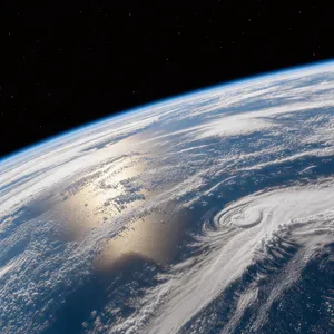 Photorealistic aerial photograph clearly showing the edge of the Earth from space, capturing realistic curvature, atmosphere, and sunlight reflections - Black Forest Labs FLUX 3 Image
