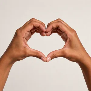 Two hands forming a heart shape together against a plain background. - Black Forest Labs FLUX 3 Image