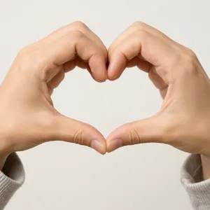 Two hands forming a heart shape together against a plain background. - Microsoft MAI-Image-2.6