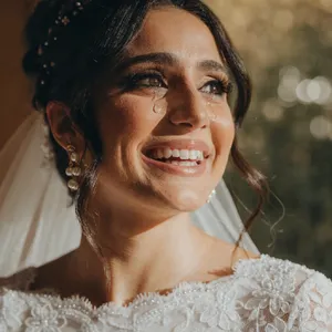A bride on her wedding day, smiling with tears of joy in her eyes. - Recraft Recraft V4.1