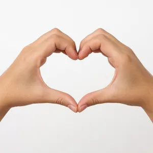Two hands forming a heart shape together against a plain background. - XAI Grok Imagine 2.0