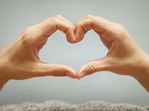 Two hands forming a heart shape together against a plain background. - XAI Grok 2 Image