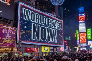 A large storefront billboard at Times Square displaying the slogan “WORLD PEACE NOW” in bold, clear letters, amidst a vibrant cityscape at night. - XAI Grok Imagine (Quality)