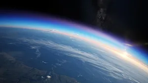 Photorealistic aerial photograph clearly showing the edge of the Earth from space, capturing realistic curvature, atmosphere, and sunlight reflections - XAI Grok Imagine (Quality)