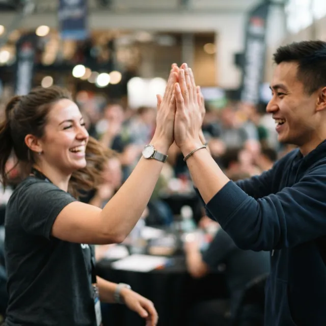 Two people high-fiving, with focus on their hands meeting mid-air - Google Nano Banana 2 Lite