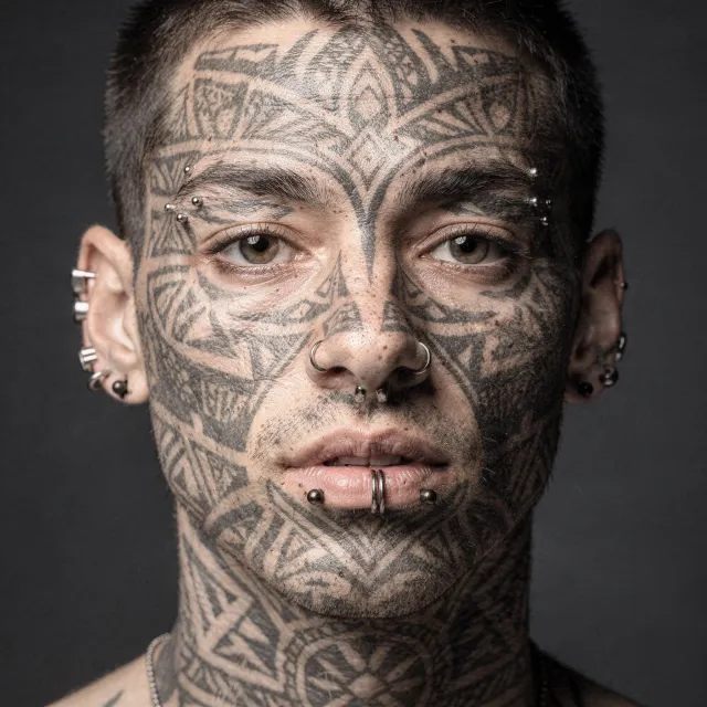 A portrait of a person with elaborate facial tattoos and piercings, shown in sharp detail - Black Forest Labs FLUX.2 Max
