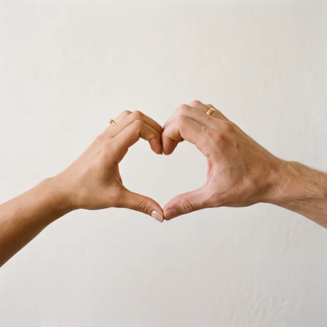 Two hands forming a heart shape together against a plain background - Google Nano Banana 2