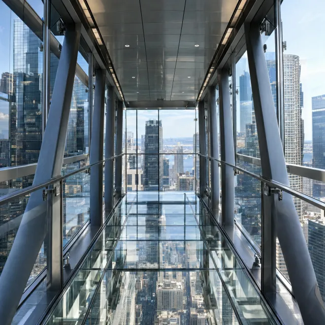 Photorealistic rendering of a contemporary glass skybridge between two skyscrapers, seen… - OpenAI GPT Image 2.5 Sunburst