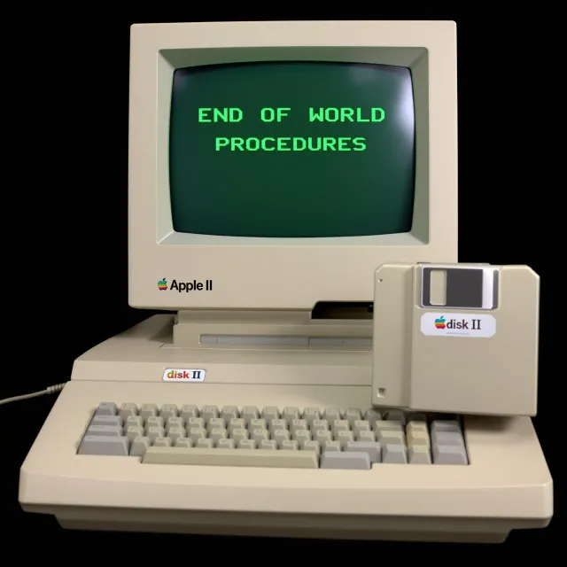 Vintage Apple II computer with green monochrome CRT screen, displaying 'END OF WORLD… - Black Forest Labs Flux 1.1 Pro Ultra