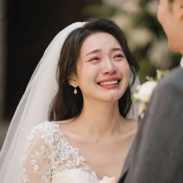 A bride on her wedding day, smiling with tears of joy in her eyes. - Seedream 3.0