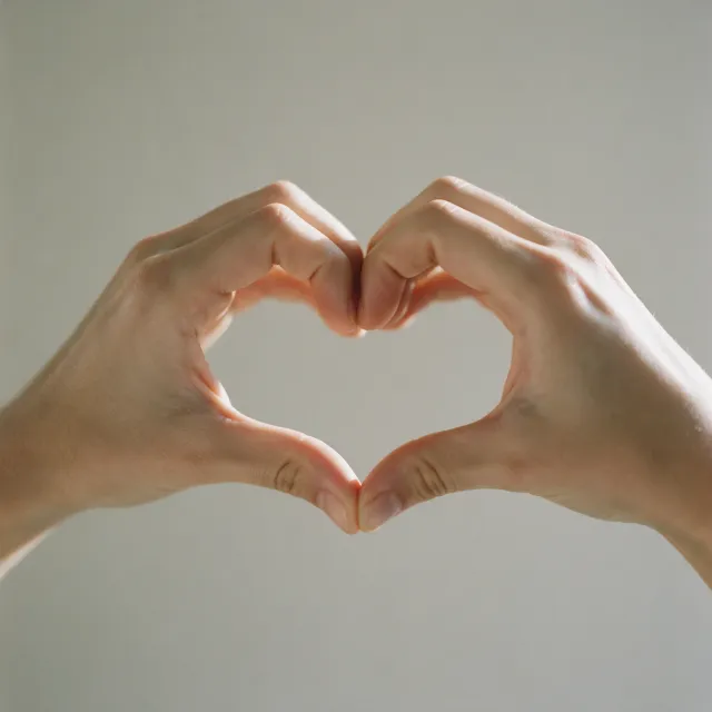 Two hands forming a heart shape together against a plain background - Bytedance Seedream 5.0 Pro