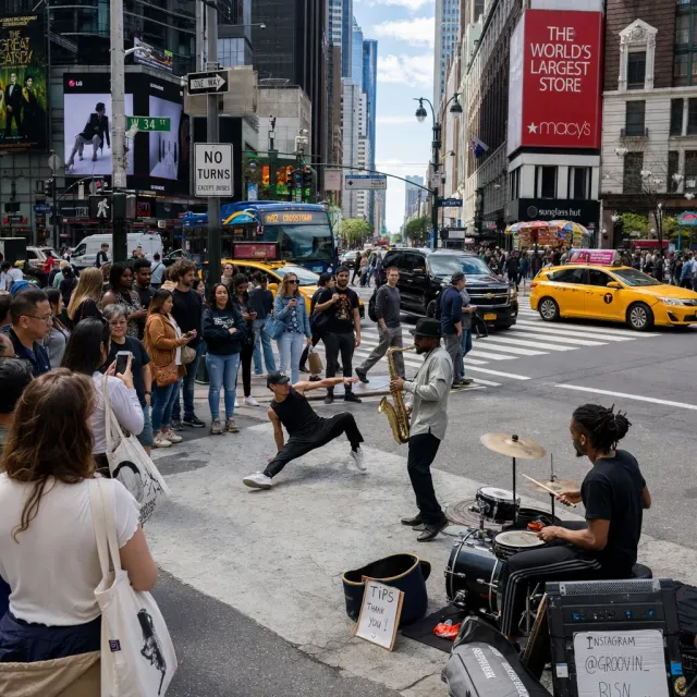 A busy city intersection with cars, pedestrians, and street performers all in one frame. - Takumi 1