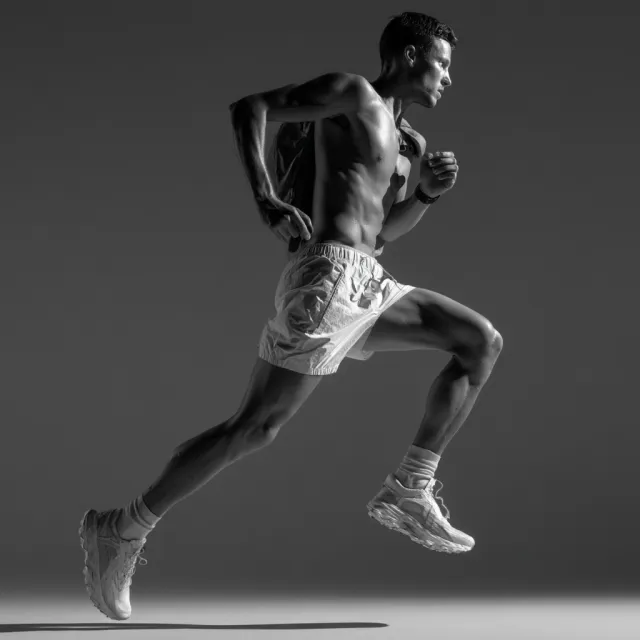 A runner mid-stride in a full-body action shot, limbs in motion and well-defined - Midjourney v7