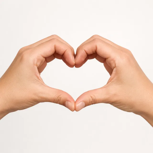 Two hands forming a heart shape together against a plain background - OpenAI GPT Image 1.5