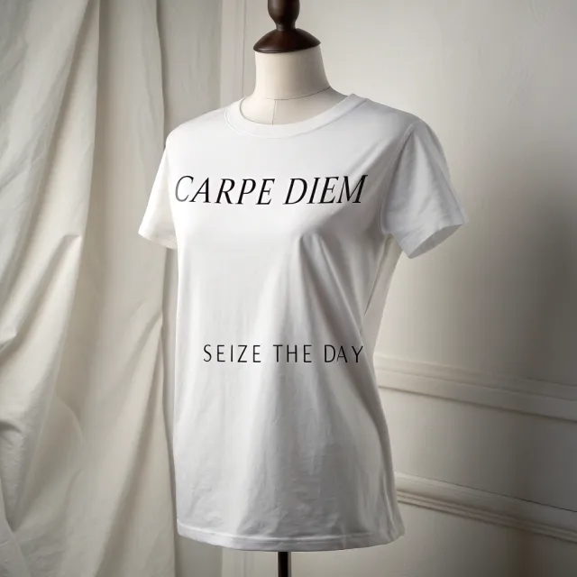 A wrinkled white T-shirt with "Carpe Diem" in bold serif font and "Seize The Day" in… - Recraft V3