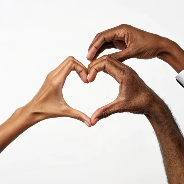 Two hands forming a heart shape together against a plain background. - Recraft V3
